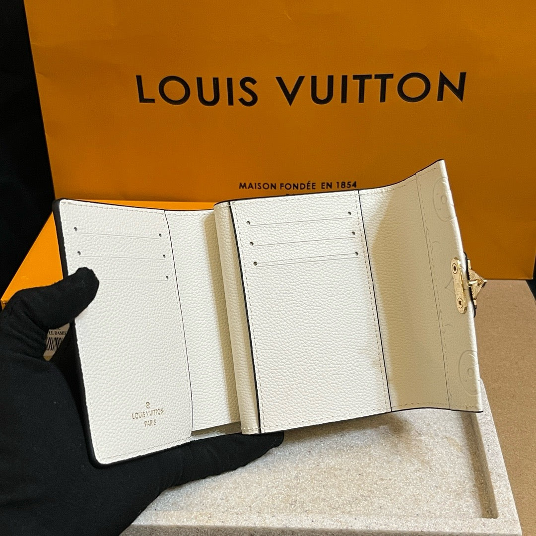 White Embossed Wallet